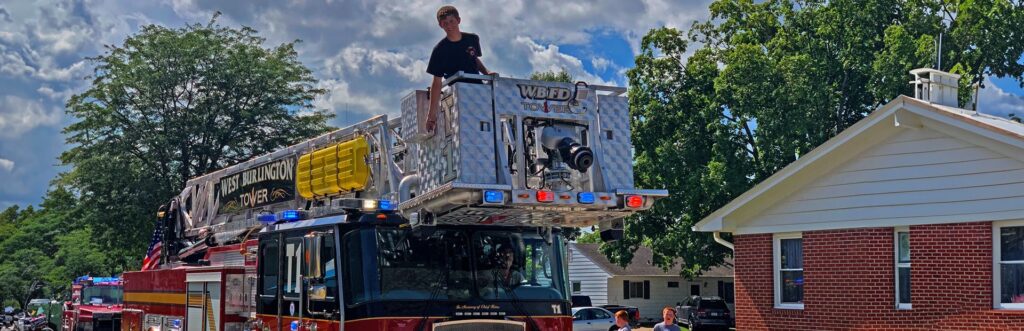 West Burlington Fire Department TOWER truck at a community event